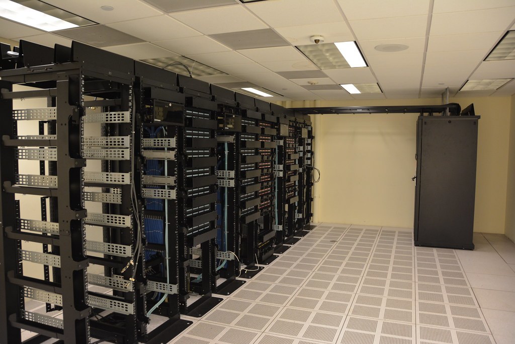 Server racks inside a data center. Illustrative infrastructure; this is not identified as a Palantir facility.